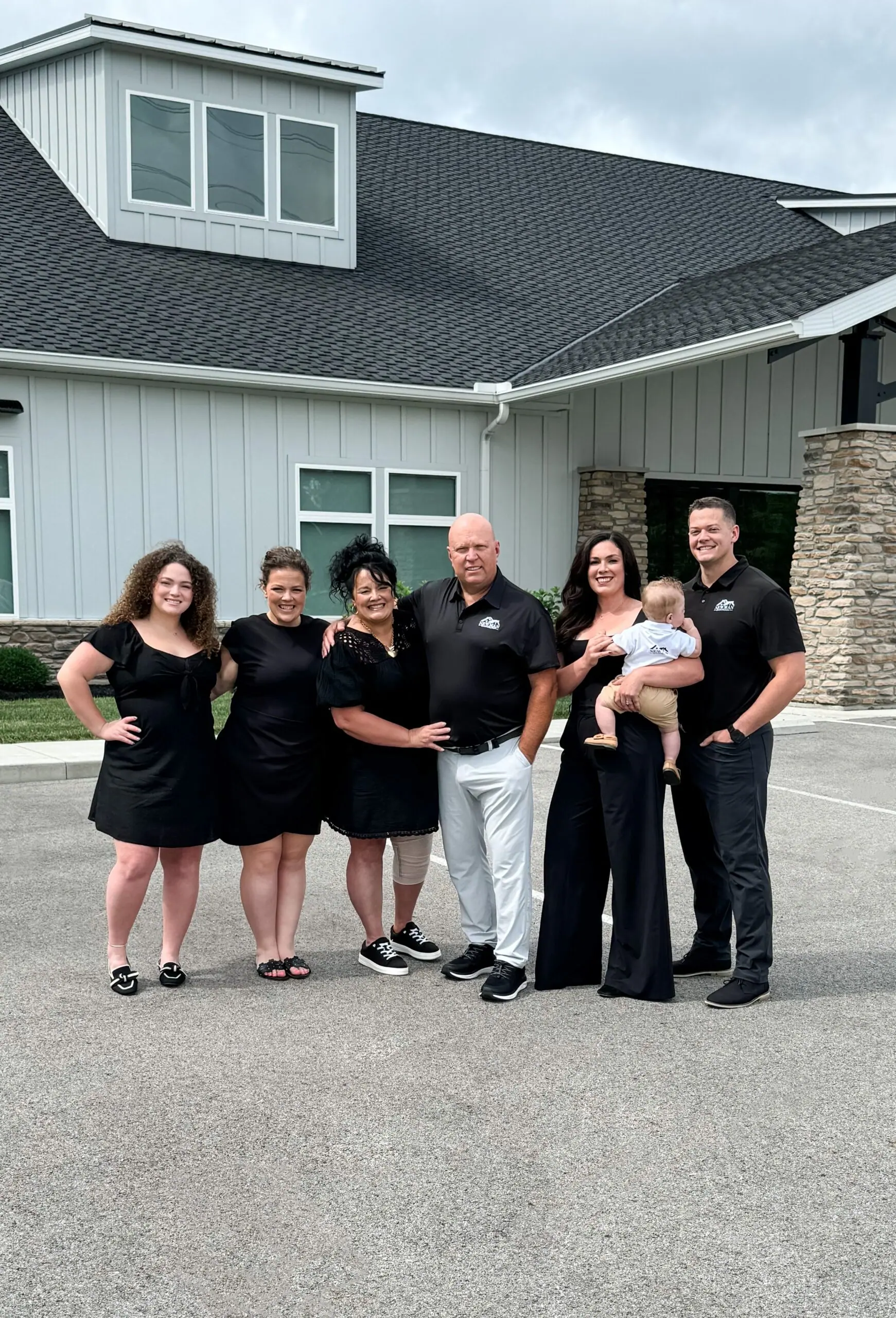 The Newman family and team